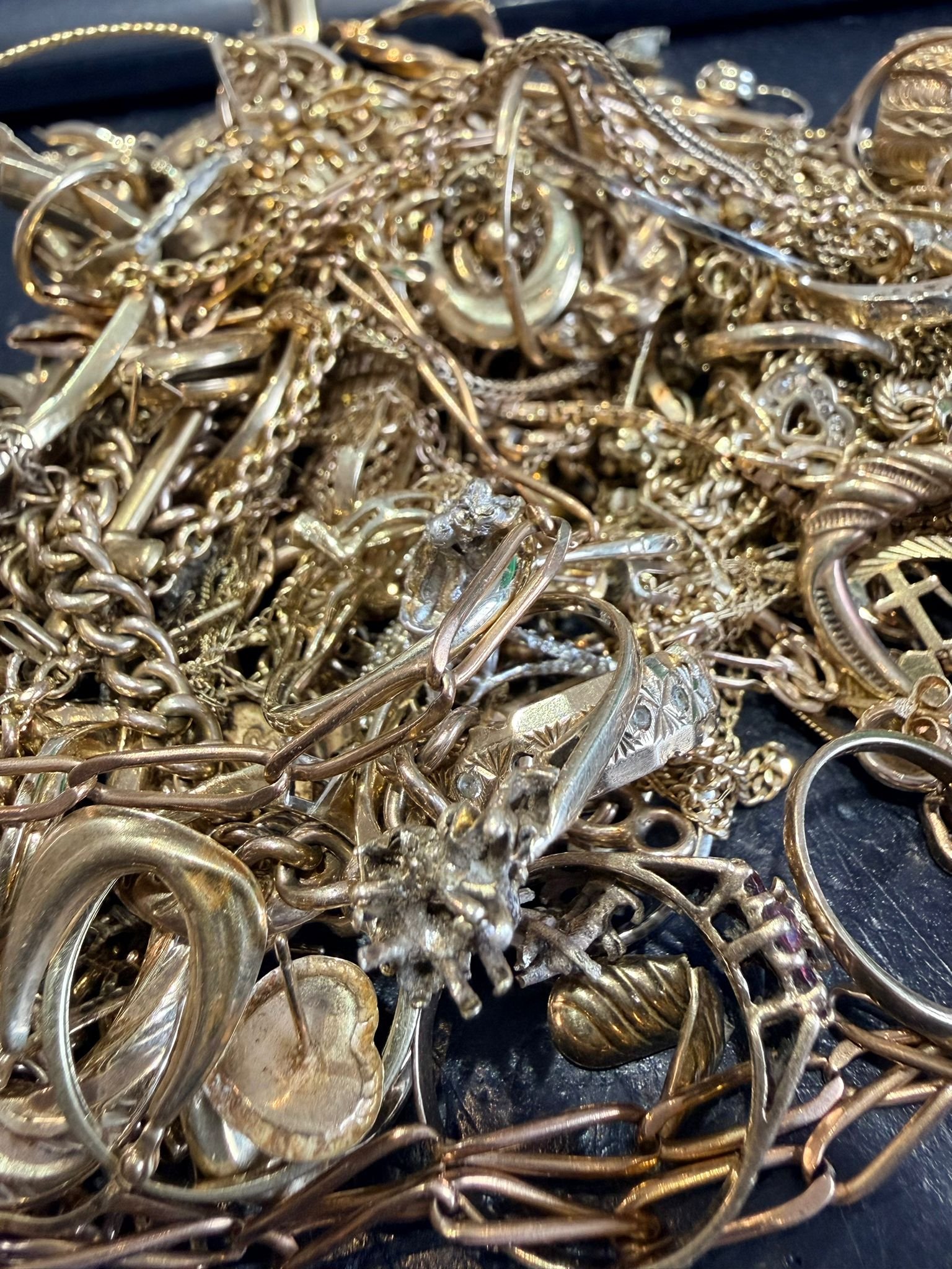 A collection of antique gold jewellery including chains, bangles and rings