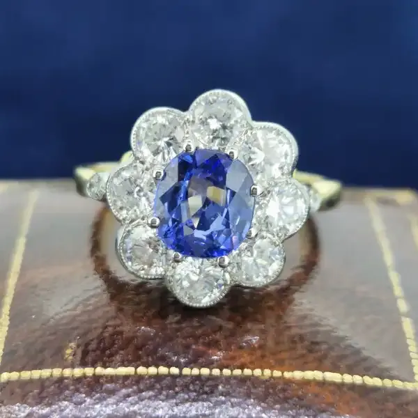 Victorian sapphire and diamond cluster ring in an antique box